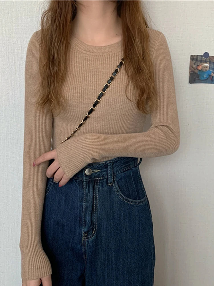 Nova blusa feminina 2025 para outono e inverno, manga longa, pulôver básico com pescoço elástico e estilo sólido em malha jumper.