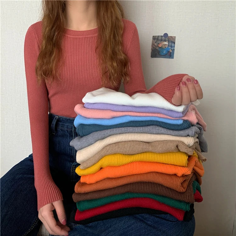 Nova blusa feminina 2025 para outono e inverno, manga longa, pulôver básico com pescoço elástico e estilo sólido em malha jumper.