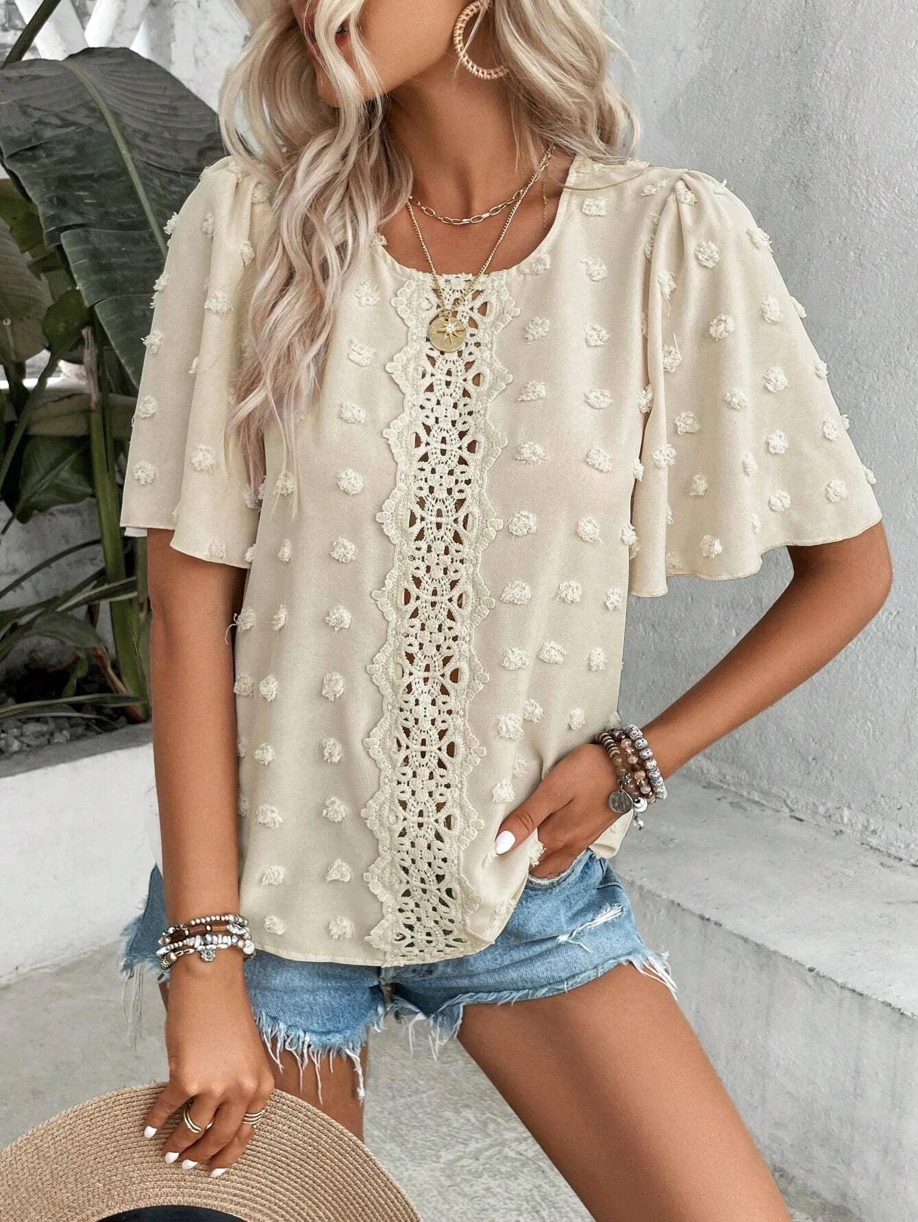 Camisa de gola redonda vazada para mulheres, estilo europeu e americano, elegante e sofisticada.