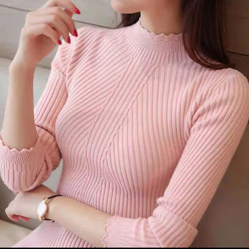 Aproveite a temporada de outono com estilo! A blusa feminina Eveisi apresenta um sofisticado mock neck e delicados babados, perfeita para compor looks casuais e elegantes.