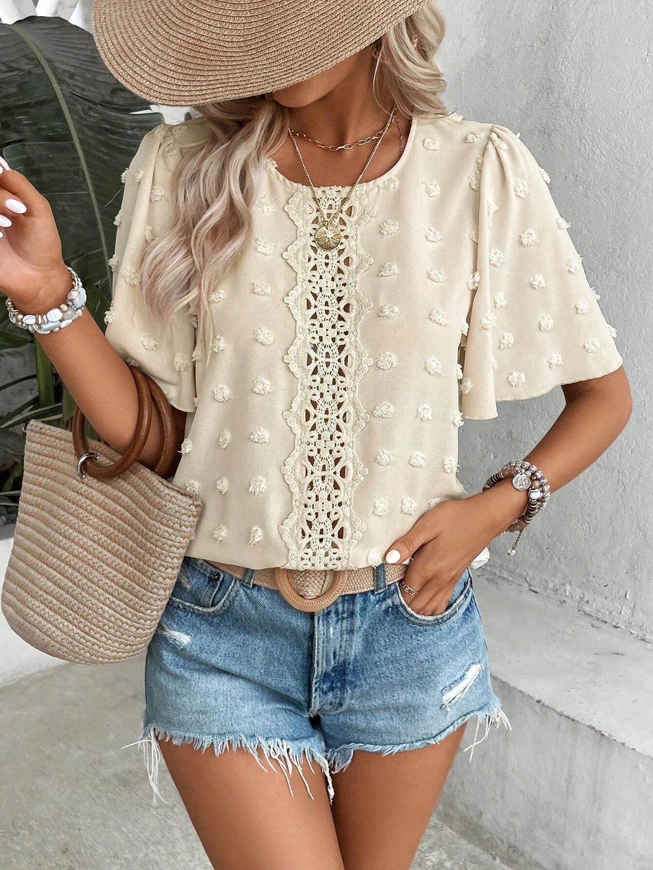 Camisa de gola redonda vazada para mulheres, estilo europeu e americano, elegante e sofisticada.