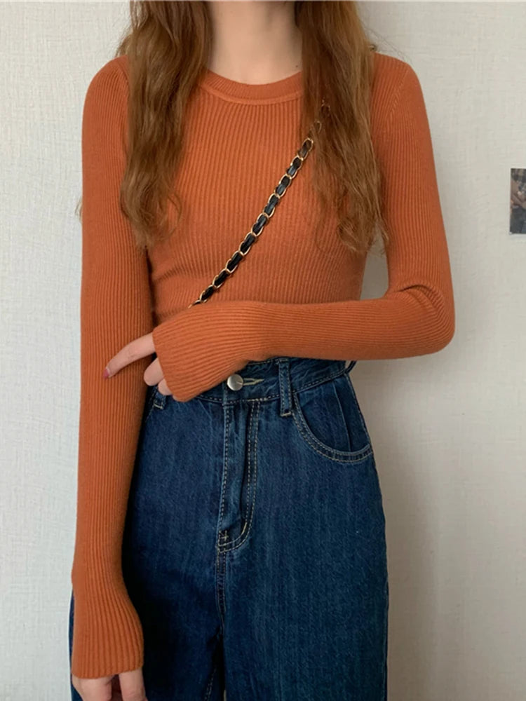 Nova blusa feminina 2025 para outono e inverno, manga longa, pulôver básico com pescoço elástico e estilo sólido em malha jumper.