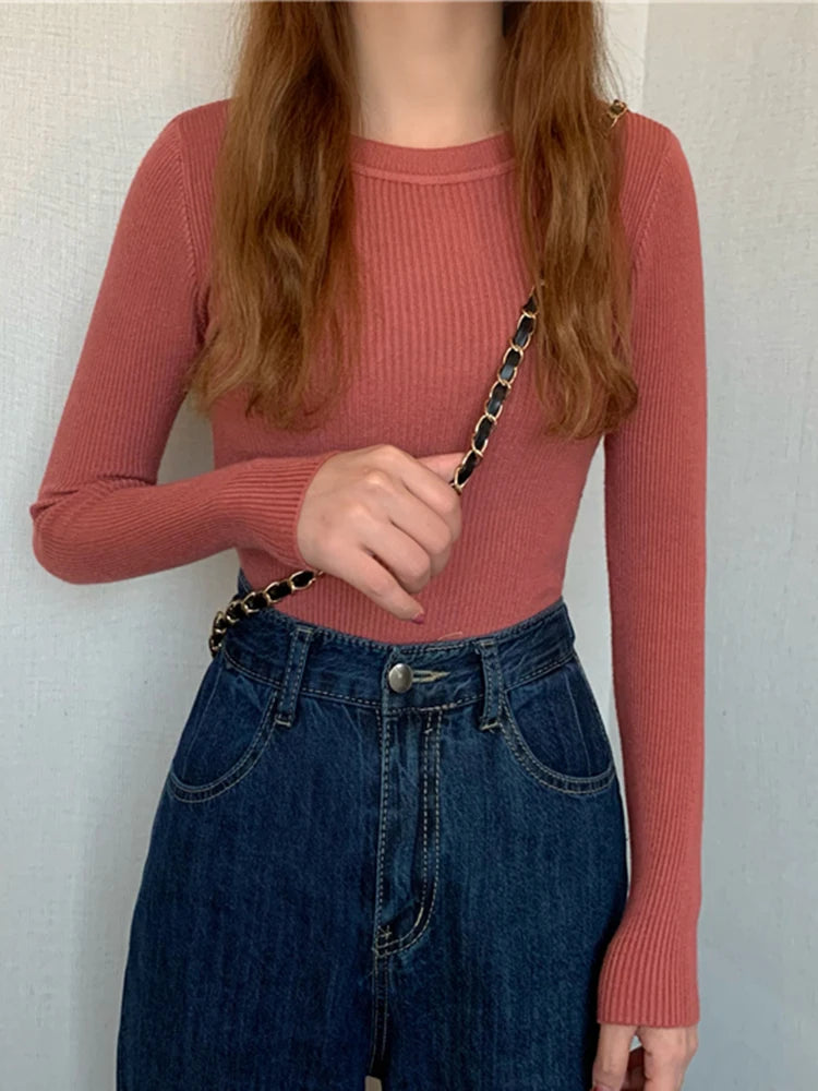 Nova blusa feminina 2025 para outono e inverno, manga longa, pulôver básico com pescoço elástico e estilo sólido em malha jumper.