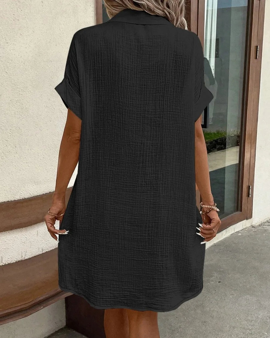 Vestido feminino de verão 2025, nova moda simples e sexy, com decote em V, botão único, mangas curtas e bolsos.