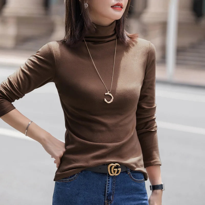 Camiseta feminina de manga longa para outono e inverno, em cor sólida. Ajuste fino, quente, ideal como roupa interior versátil ou como camisa básica.