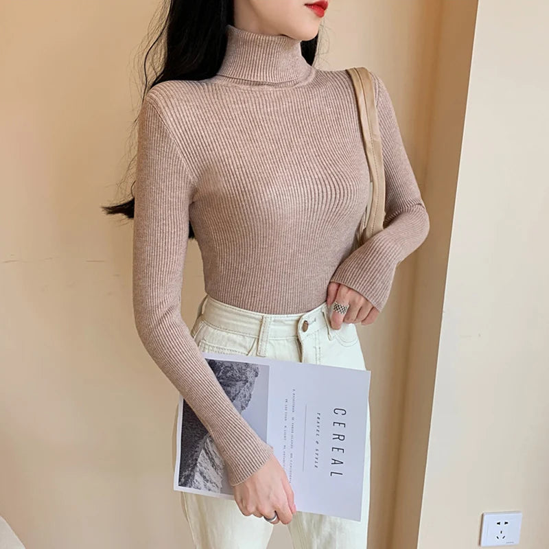 Blusa Feminina de Outono/Inverno 2025: Pulôver de Malha com Manga Longa, Gola Alta e Nervuras, Dobrável, Macia e Quente.