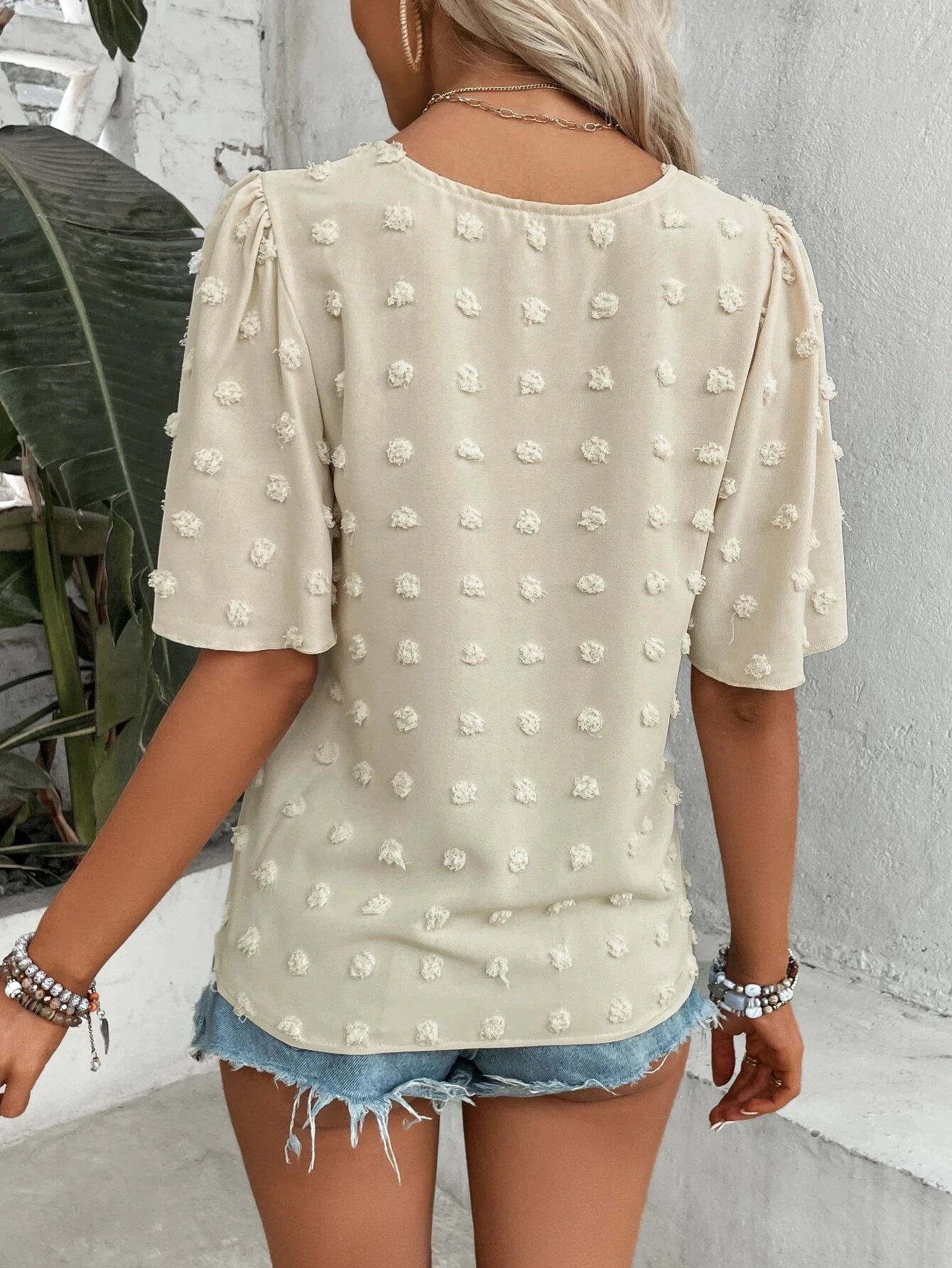 Camisa de gola redonda vazada para mulheres, estilo europeu e americano, elegante e sofisticada.