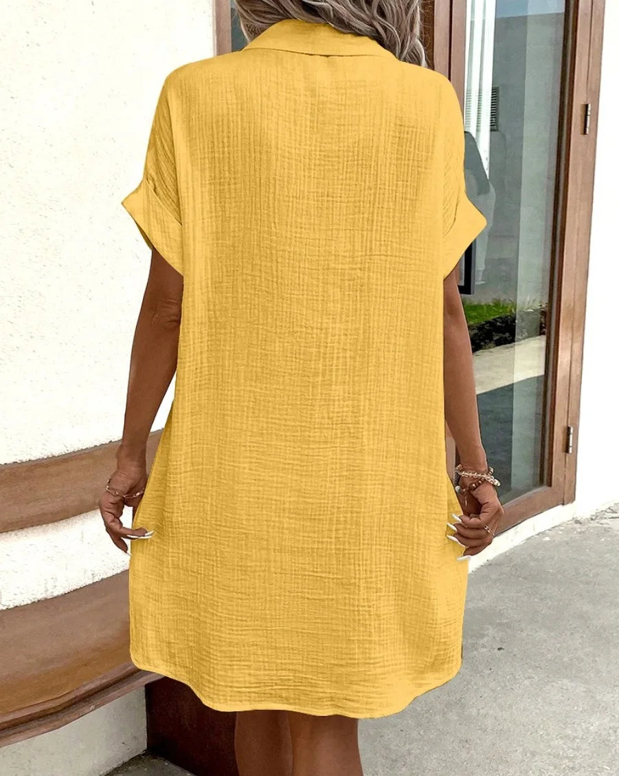 Vestido feminino de verão 2025, nova moda simples e sexy, com decote em V, botão único, mangas curtas e bolsos.