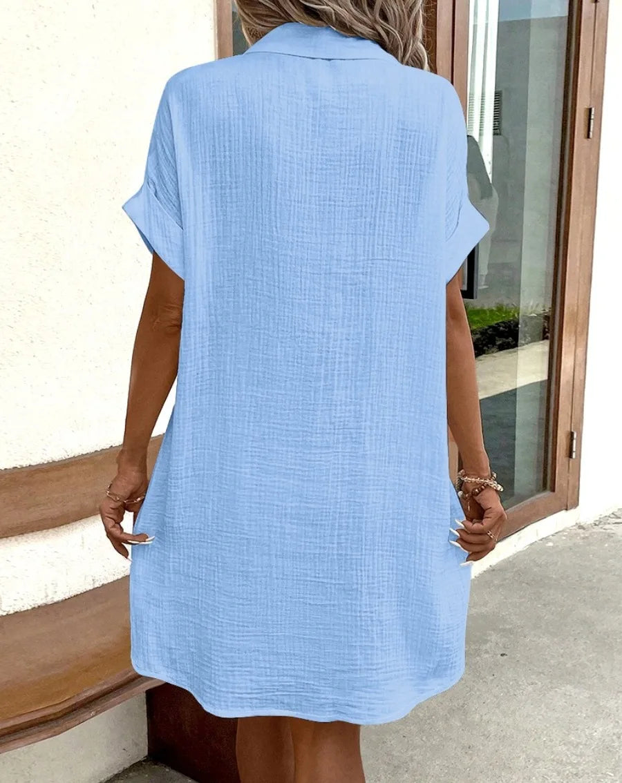 Vestido feminino de verão 2025, nova moda simples e sexy, com decote em V, botão único, mangas curtas e bolsos.