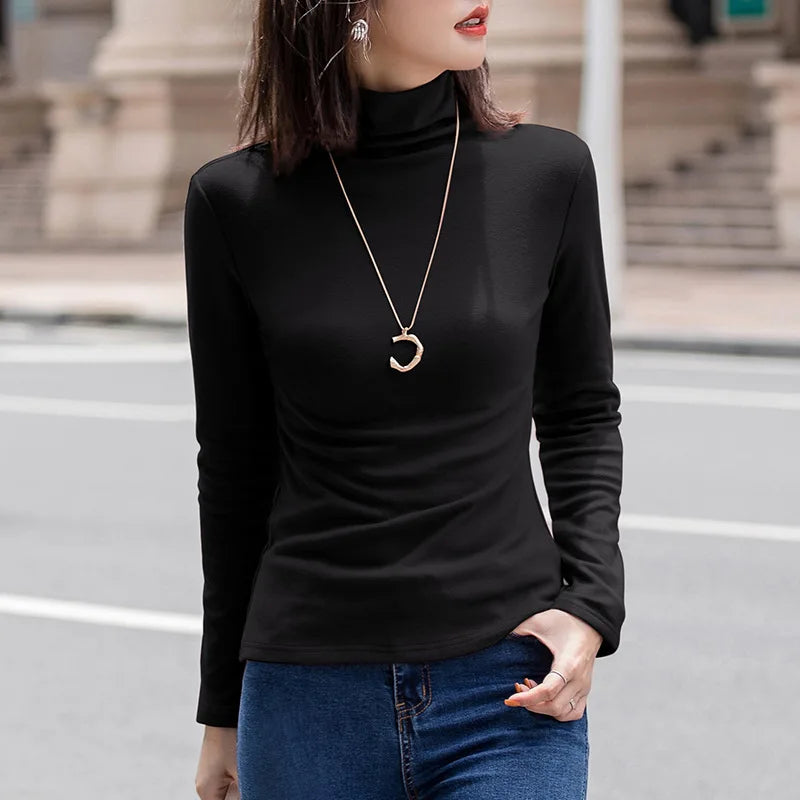 Camiseta feminina de manga longa para outono e inverno, em cor sólida. Ajuste fino, quente, ideal como roupa interior versátil ou como camisa básica.