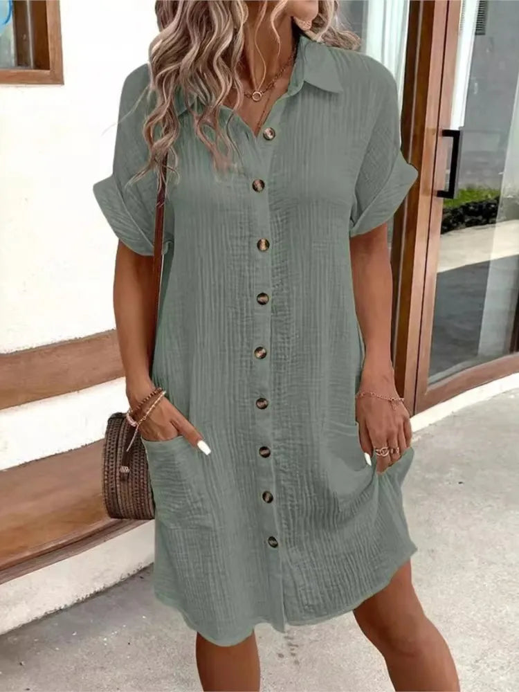 Vestido feminino de verão 2025, nova moda simples e sexy, com decote em V, botão único, mangas curtas e bolsos.