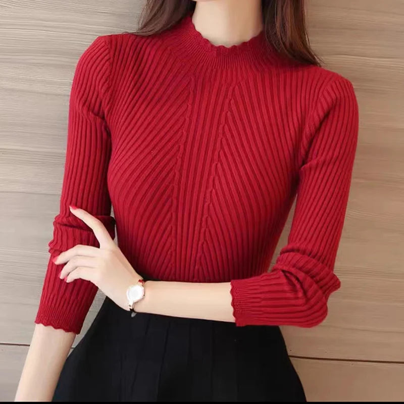 Aproveite a temporada de outono com estilo! A blusa feminina Eveisi apresenta um sofisticado mock neck e delicados babados, perfeita para compor looks casuais e elegantes.
