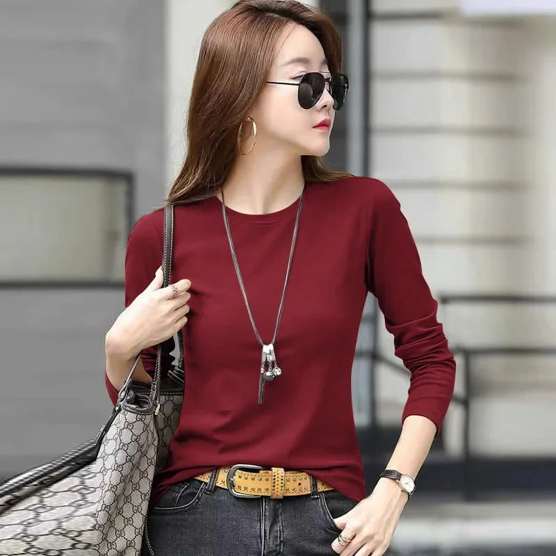 Camiseta feminina slim fit de manga longa com gola redonda, estilo simples e elegante, decorada com detalhes em linha, perfeita para o outono e inverno, feita de poliéster.