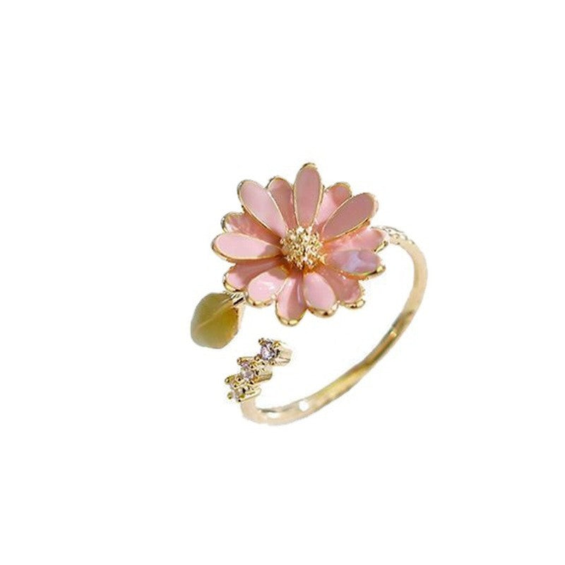 Anel ajustável feminino com design de flor margarida luxuosa, folha detalhada, em cobre com banho dourado, ideal para uso diário, festas e presente especial.
