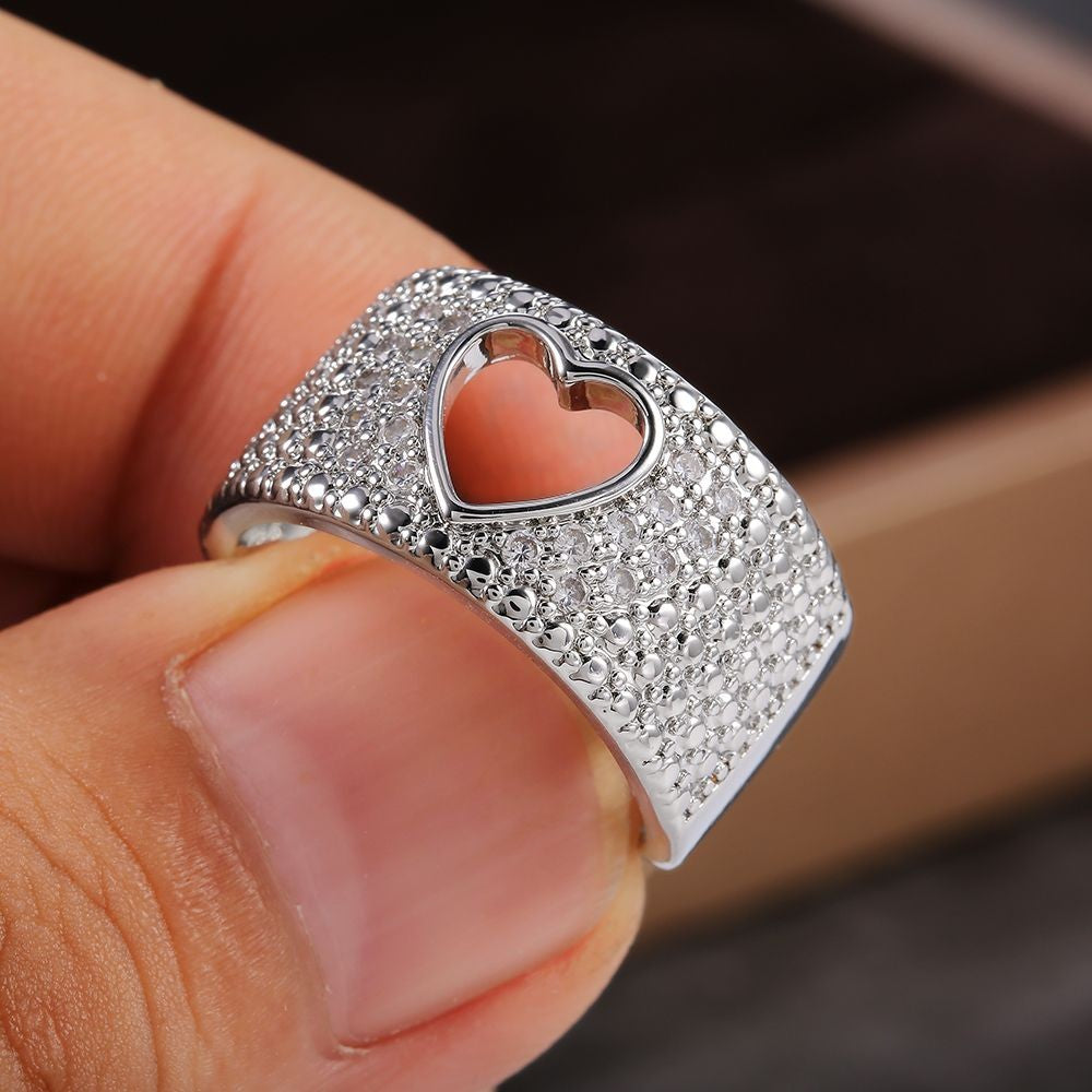 Huitan – Anel de Dedo com Design Vazado em Coração, Cristal Brilhante e Zircônia Cúbica, Joia Feminina para Festa ou Casamento.